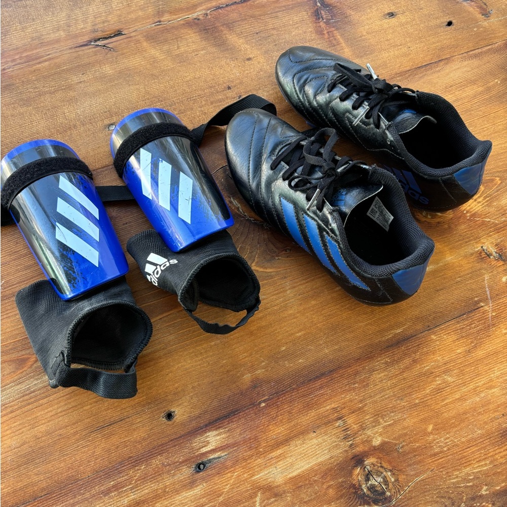Adidas boys soccer cleats and shin guards